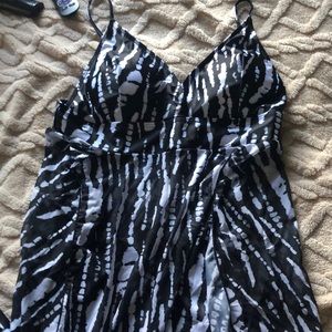 Two piece swim suit with sheer cover attached to top.👙